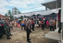 Kapolsek Ciawigebang Pimpin Pengamanan Gerakan Pangan Murah di Balai Desa Susukan