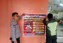 Bhabinkamtibmas Desa Kadurama Pasang Spanduk Himbauan Kamtibmas, Ajak Warga Tingkatkan Kewaspadaan