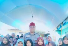 Pastikan Kegiatan Berjalan Aman, Bhabinkamtibmas Kapandayan Laksanakan Pengamanan Tasyakur Khotmil Qur’an di Desa Kapandayan