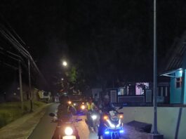Bhabinkamtibmas Desa Pamijahan Amankan dan Kawal Pawai Obor Tahun Baru Islam 1448 H