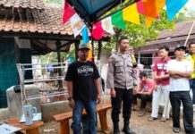 Bhabinkamtibmas Monitoring Pawai dan Lomba Sepeda Hias Meriahkan HUT ke-81 Kemerdekaan RI di Desa Sidaraja