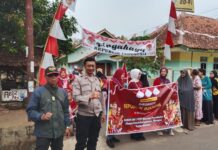 Semarak HUT ke-81 Kemerdekaan RI, Bhabinkamtibmas Polsek Ciawigebang Amankan Pawai dan Lomba Sepeda Hias di Desa Sidaraja