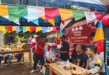 Bhabinkamtibmas Amankan dan Monitoring Lomba Sepeda Hias Meriahkan HUT ke-81 Kemerdekaan RI di Desa Sidaraja