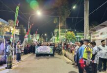 Bhabinkamtibmas, Babinsa dan Linmas Desa Sidaraja Kawal Pawai Ta’aruf Maulid Nabi Muhammad SAW 1448 H