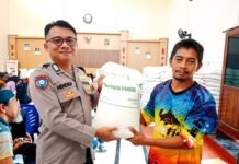 Bhabinkamtibmas Desa Kadurama Amankan Penyaluran Bantuan Pangan Beras untuk 497 KPM