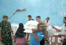 Sinergi Bhabinkamtibmas dan Babinsa Desa Ciawilor, Penyaluran Bantuan Pangan Beras untuk 1.550 KPM Berlangsung Kondusif