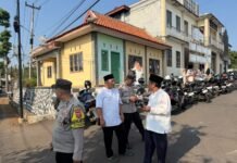 Jaga Kekhusyukan Hari Santri 2026, Kanit Binmas Polsek Mandirancan Aipda Rosid, A.Md. Siagakan Pengamanan